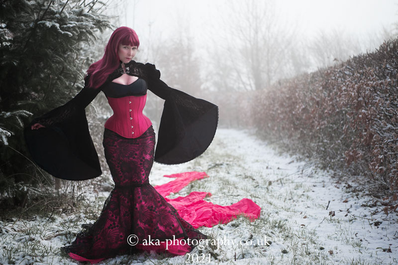 I made this fishtail skirt. It's made of lace and it has a changeable lining so that when you change the petticoat you can change the whole colour of the outfit! I haven't got around to making a different colour yet...