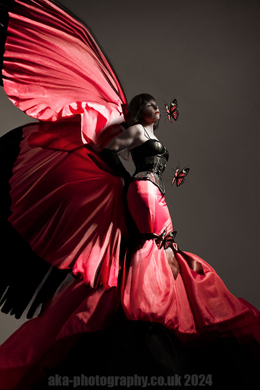 Portrait photo. Woman merging into a butterfly.