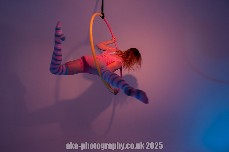 Aerial hoop, crocodile pose.